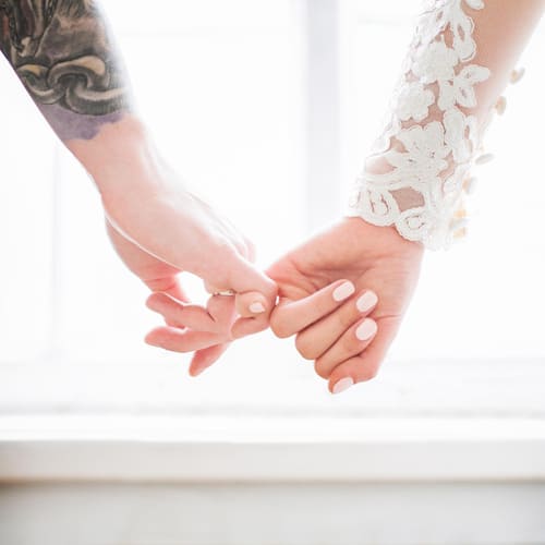 Just online married couple hands